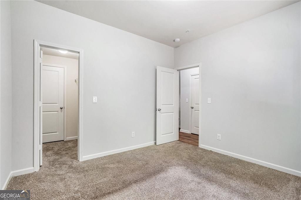 4043 Avalon Road Southwest Atlanta, GA 30331 - Photo 6 of 10 a view of an empty room