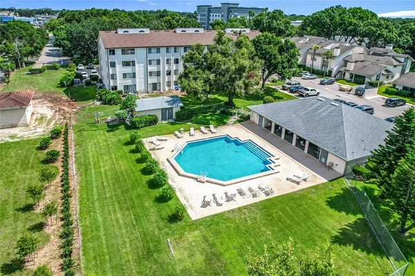 an aerial view of a house with a garden