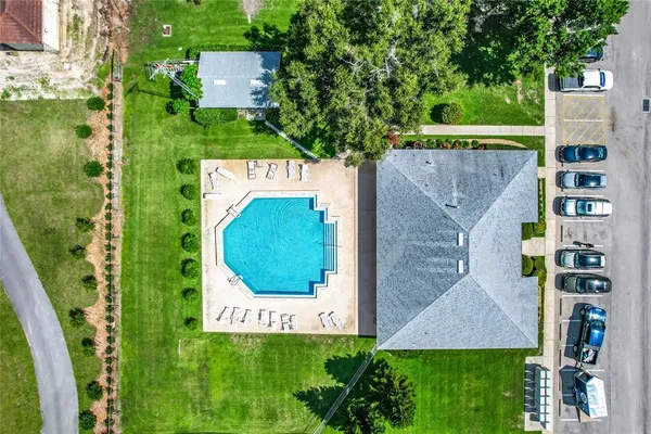 an aerial view of a house with a garden
