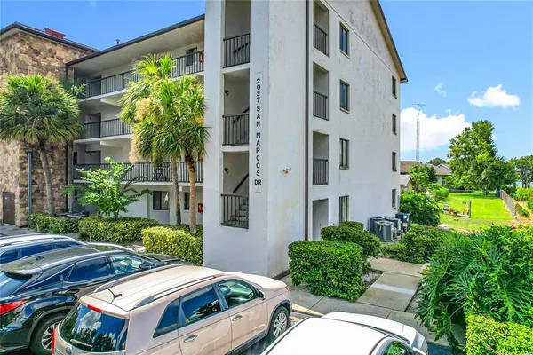 a car parked in front of a building