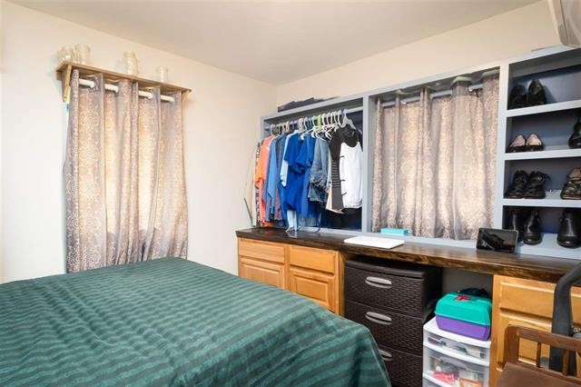 8092 Mt Carmel Road Decaturville, TN 38329 - Photo 13 of 24 a bedroom with a bed and a furniture