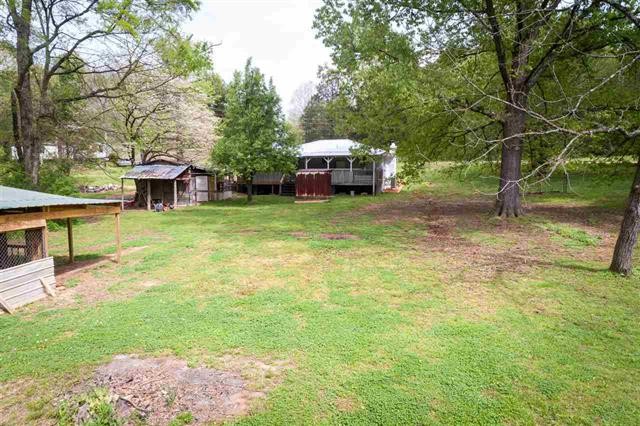 8092 Mt Carmel Road Decaturville, TN 38329 - Photo 18 of 24 a view of a yard in front of house