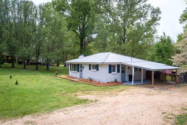 8092 Mt Carmel Road Decaturville, TN 38329 - Photo 24 of 24 a view of a house with a yard