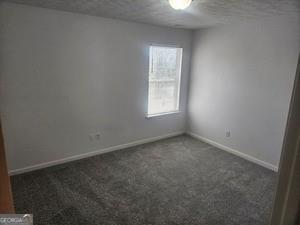 9432 Lakeview Road Union City, GA 30291 - Photo 10 of 11 an empty room with a window