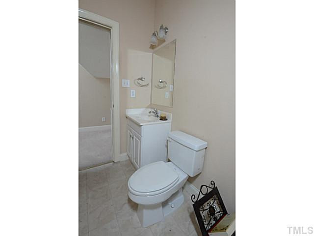 1815 Shaw Road Durham, NC 27704 - Photo 18 of 24 Upstairs half bath is oversized in case the new owners would ever want to install a tub or shower. Bathroom