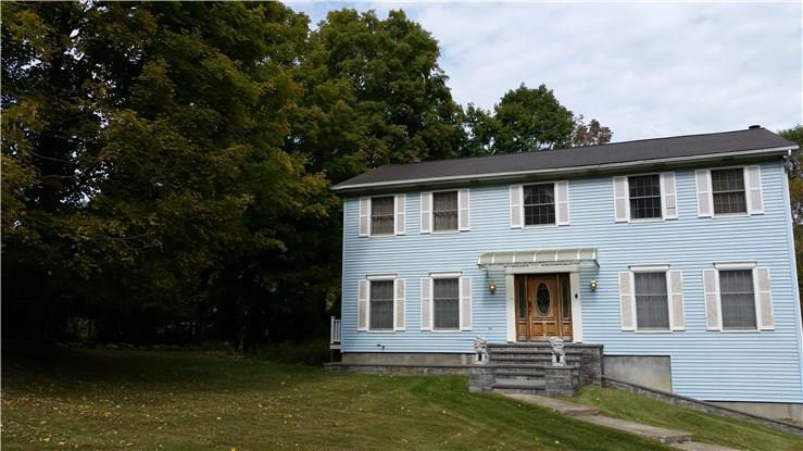 131 Briar Ridge Road Danbury, CT 06810 - Photo 1 of 1 a front view of a house with garden