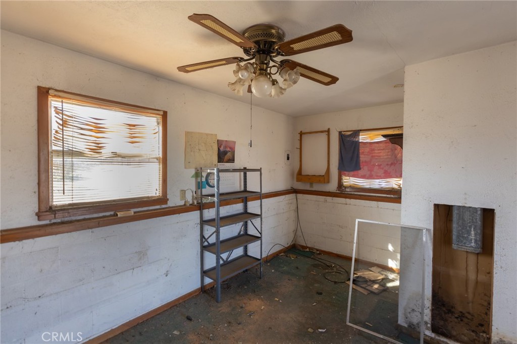 25640 Jasper Road Barstow, CA 92311 - Photo 24 of 48 a view of a livingroom with furniture and window