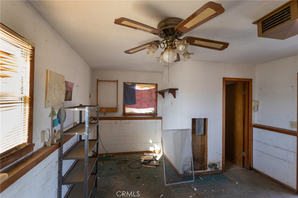 25640 Jasper Road Barstow, CA 92311 - Photo 25 of 48 a view of a living room with furniture and a window