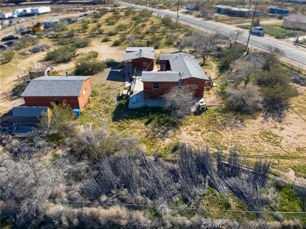 25640 Jasper Road Barstow, CA 92311 - Photo 41 of 48 a view of a house with a yard