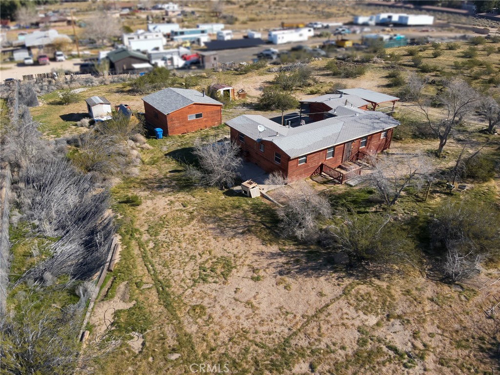 25640 Jasper Road Barstow, CA 92311 - Photo 42 of 48 an aerial view of a house with a yard