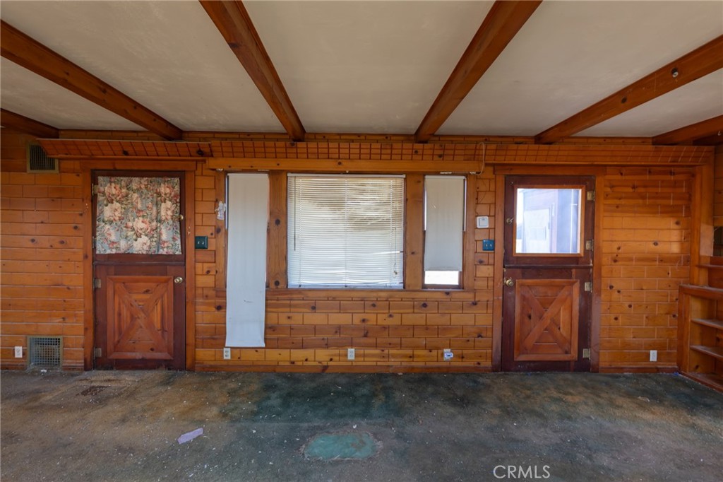 25640 Jasper Road Barstow, CA 92311 - Photo 7 of 48 an empty room with windows