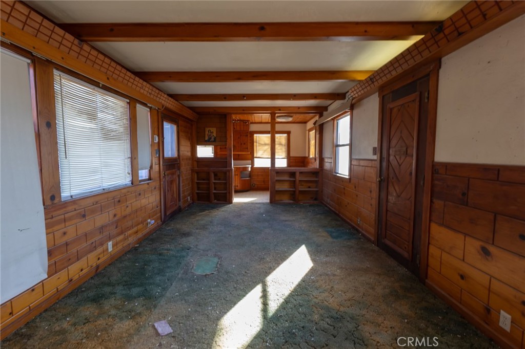 25640 Jasper Road Barstow, CA 92311 - Photo 9 of 48 a view of hallway with windows