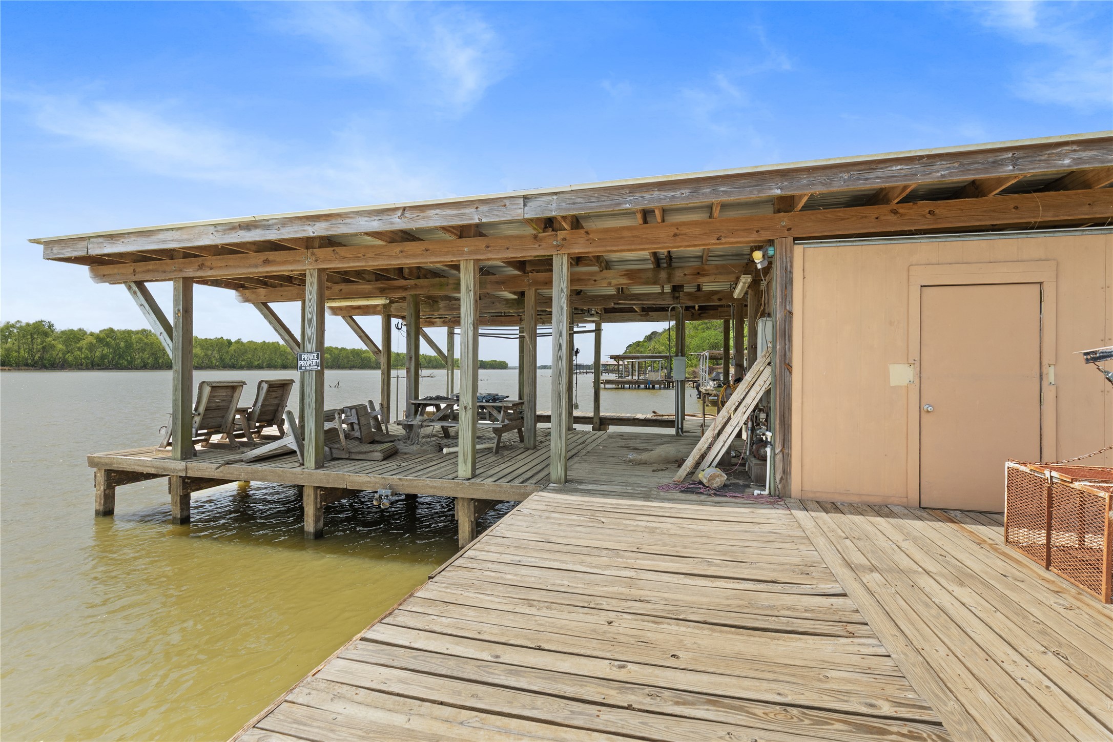 174 Lake Front Drive Trinity, TX 75862 - Photo 38 of 44 a view of a swimming pool with outdoor seating