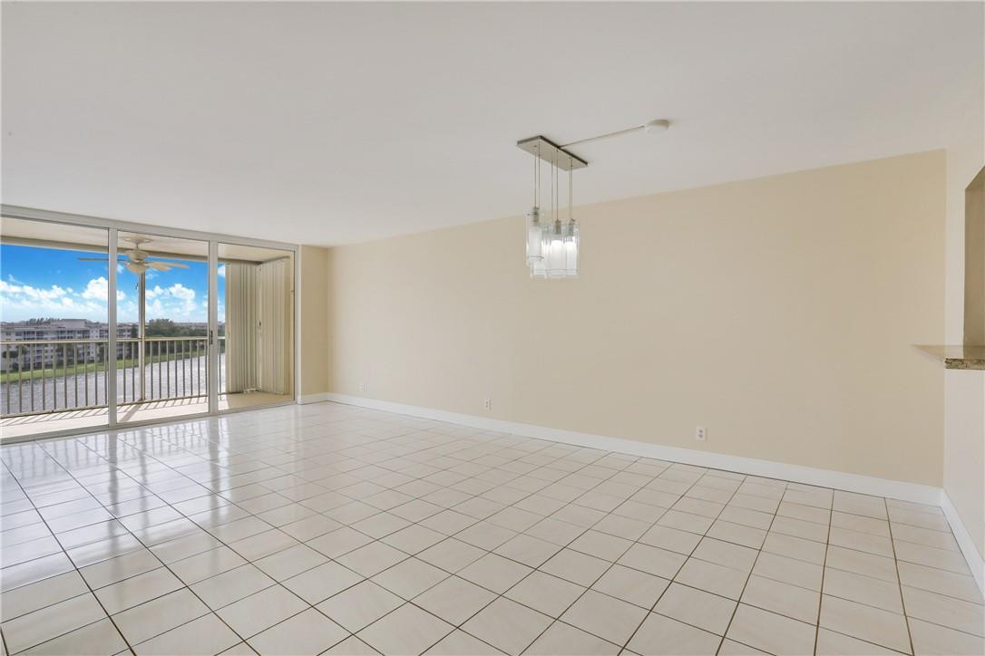 2900 North Course Drive, Unit 810 Pompano Beach, FL 33069 - Photo 11 of 21 Spacious and bright dining/living room
