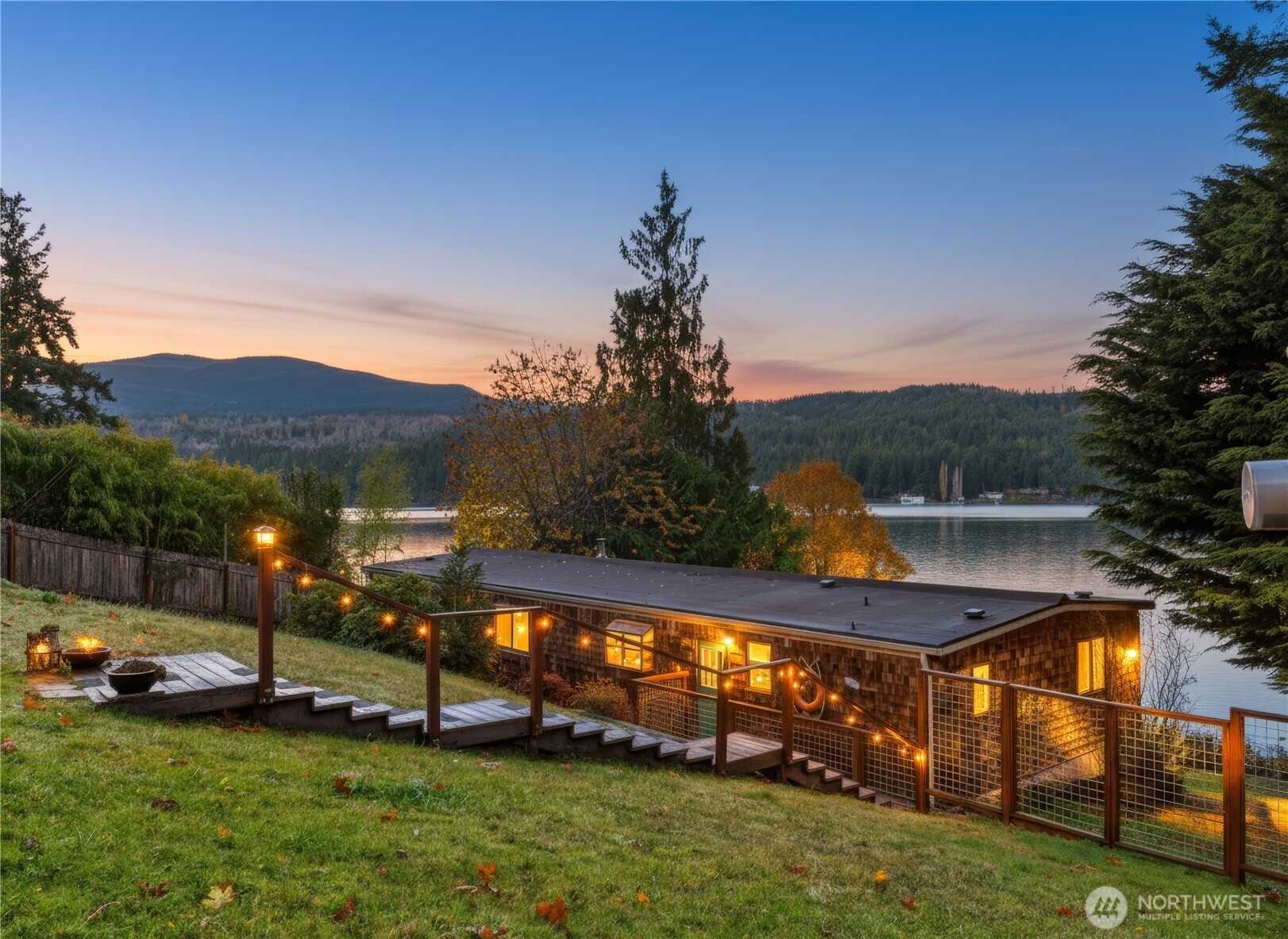 a view of yard with swimming pool and green space