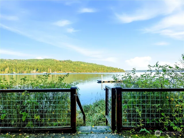 a view of a balcony next to a lake view