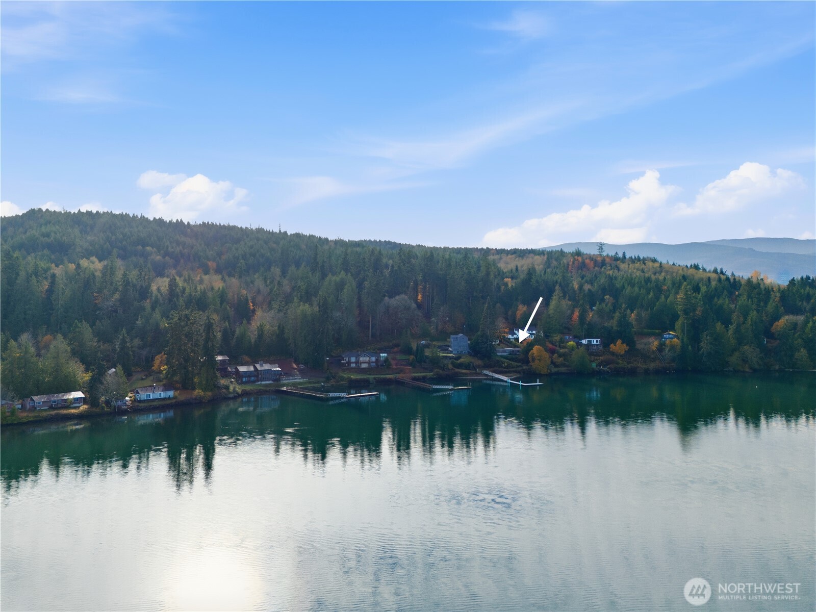 813 Fairmount Road Port Townsend, WA 98368 - Photo 28 of 30 a view of a lake with a mountain in the background