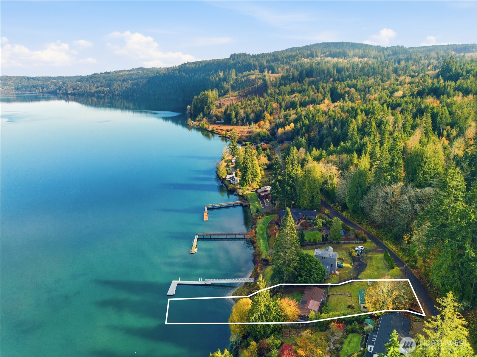 813 Fairmount Road Port Townsend, WA 98368 - Photo 3 of 30 a view of a lake with a mountain in the background
