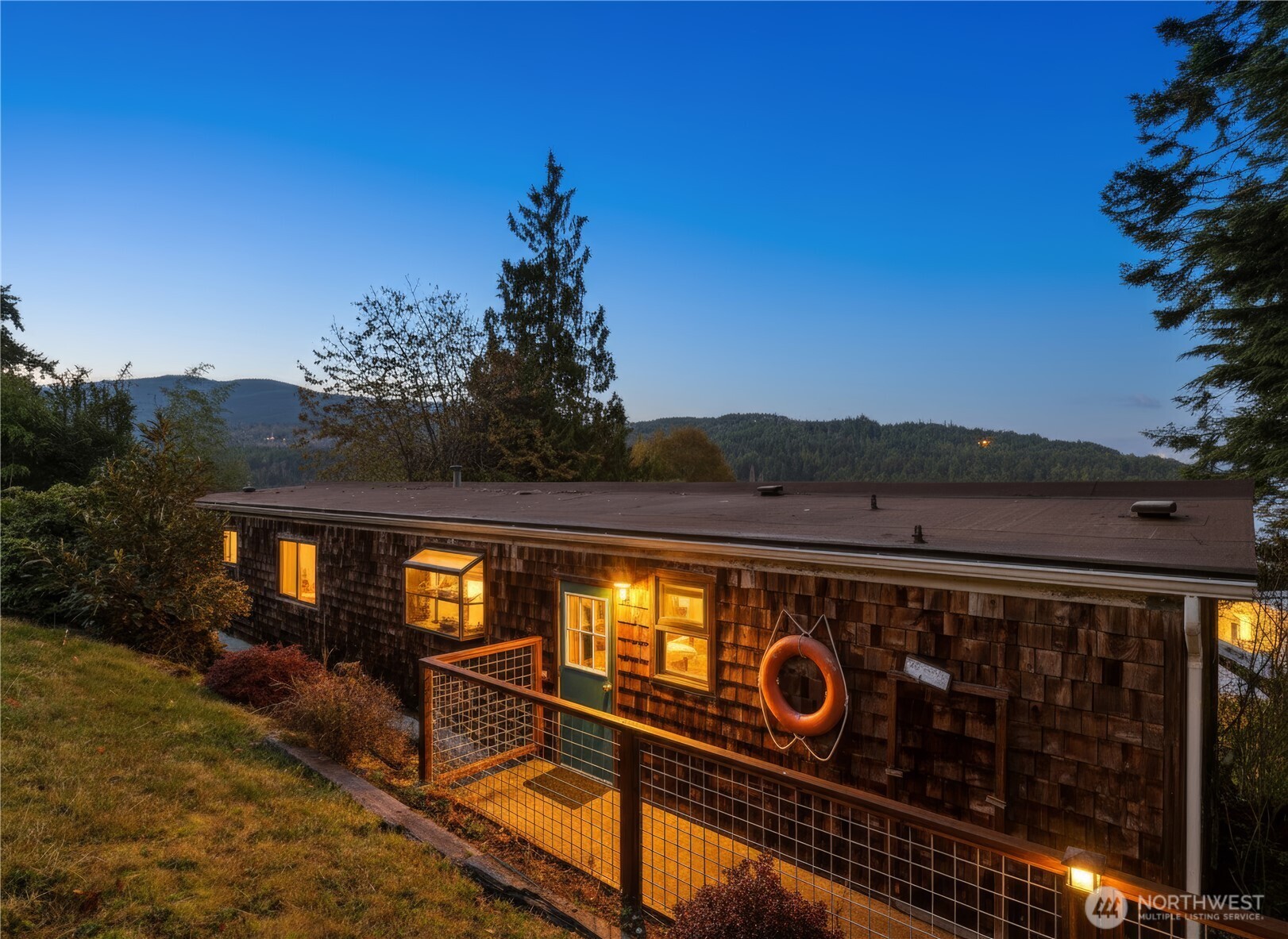 813 Fairmount Road Port Townsend, WA 98368 - Photo 4 of 30 a view of a backyard with sitting area