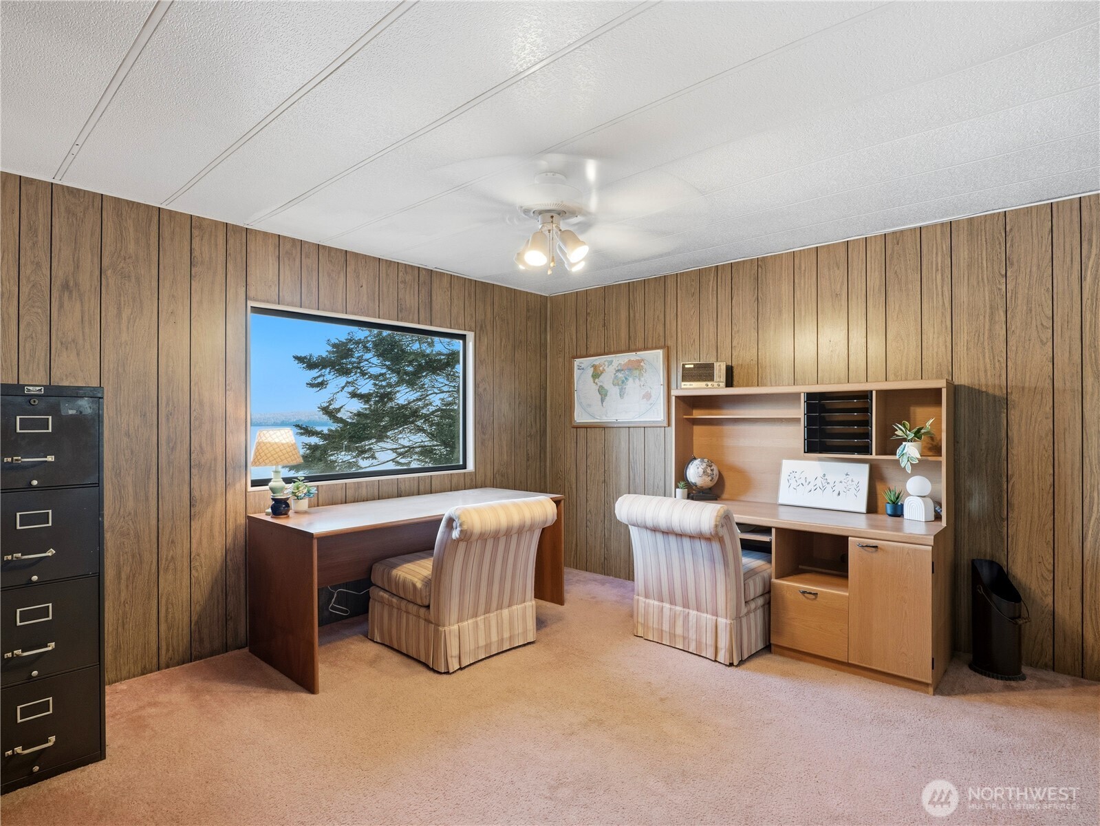 813 Fairmount Road Port Townsend, WA 98368 - Photo 6 of 30 a living room with stainless steel appliances kitchen island furniture and a window