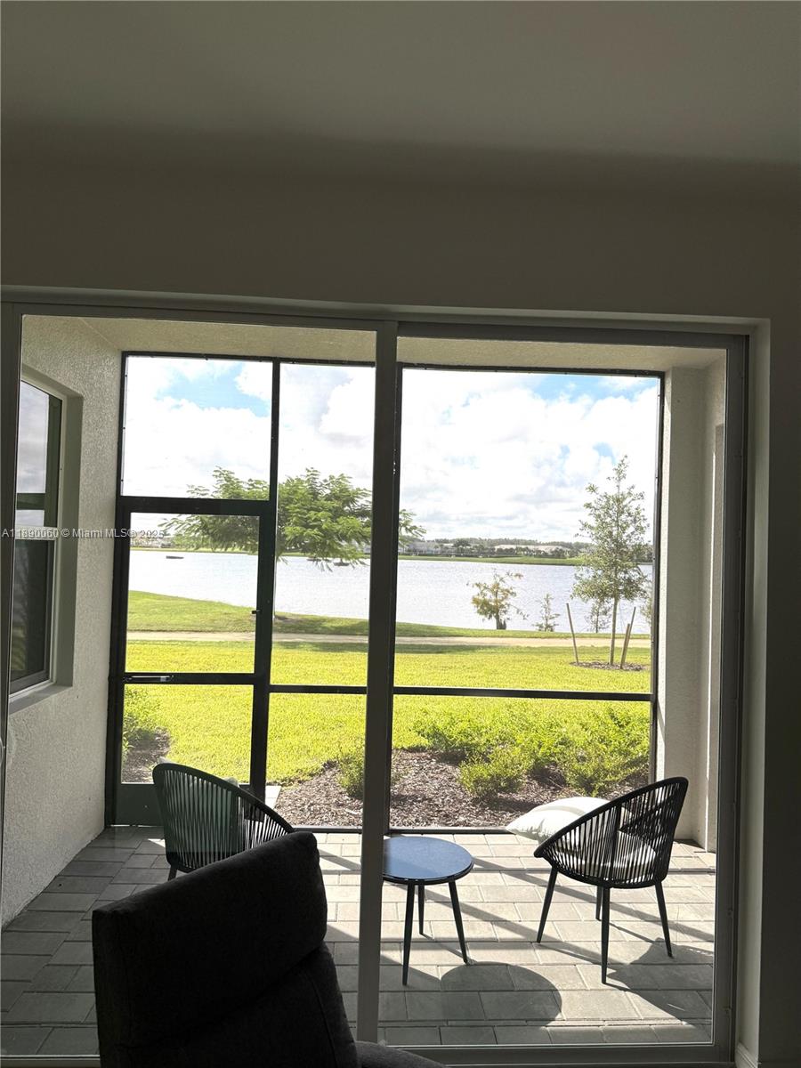 5555 Double Eager Circle, Unit 3917 Immokalee, FL 34142 - Photo 9 of 16 a view of a city from a living room