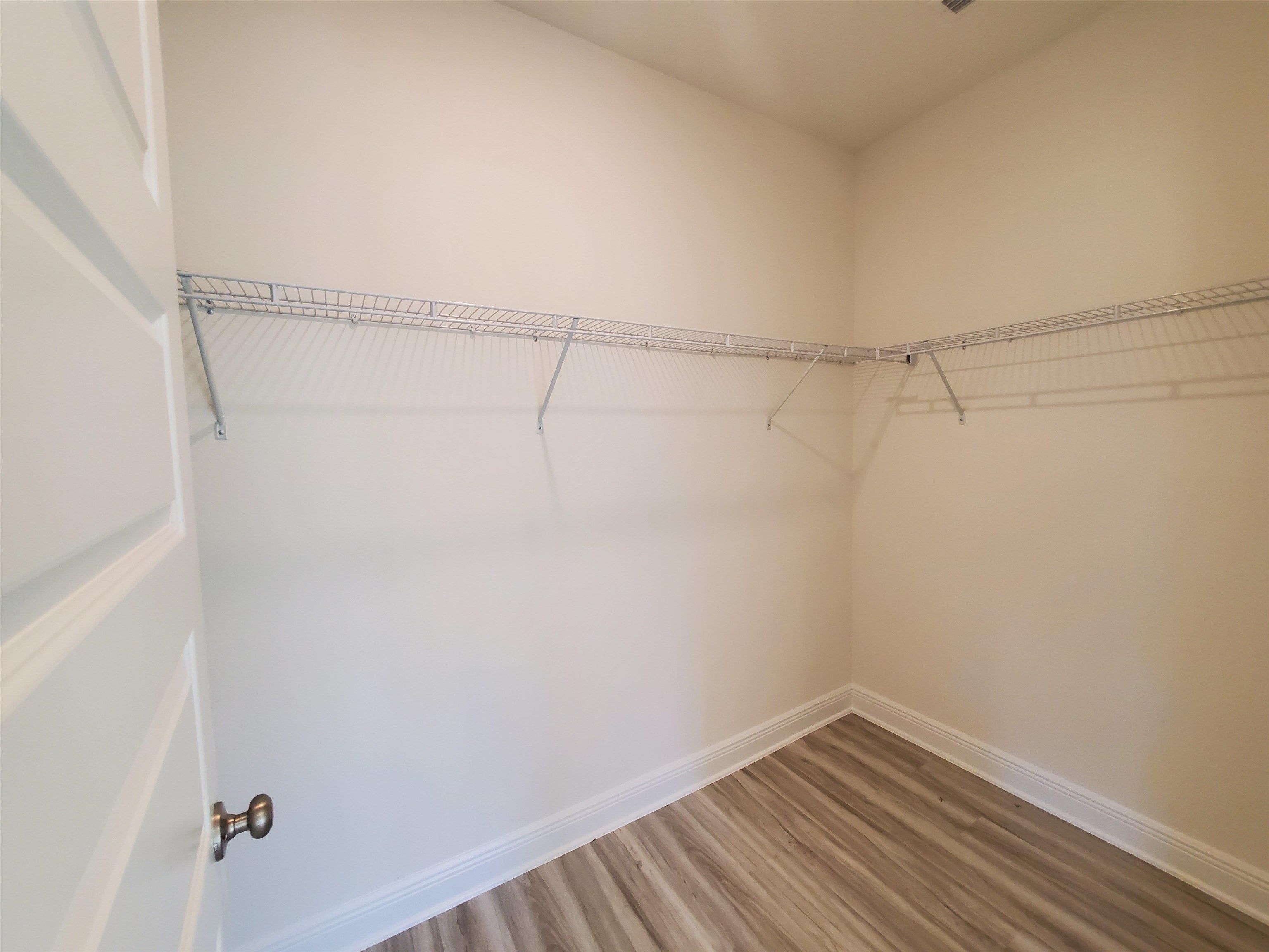 1119 Pencarro Boulevard Foley, AL 36535 - Photo 6 of 26 Primary Walk-in Closet