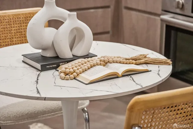 a kitchen with a sink a stove and cabinets