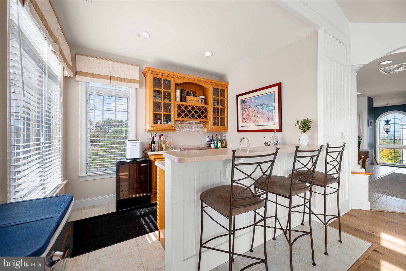 12901 Old Bridge Road, Unit PH8 2 Ocean City, MD 21842 - Photo 11 of 79 a view of a dining room with furniture window and outside view