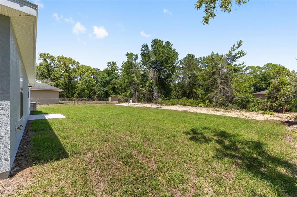 29 Olive Cir Loop Ocala, FL 34472 - Photo 11 of 49 a view of outdoor space with garden
