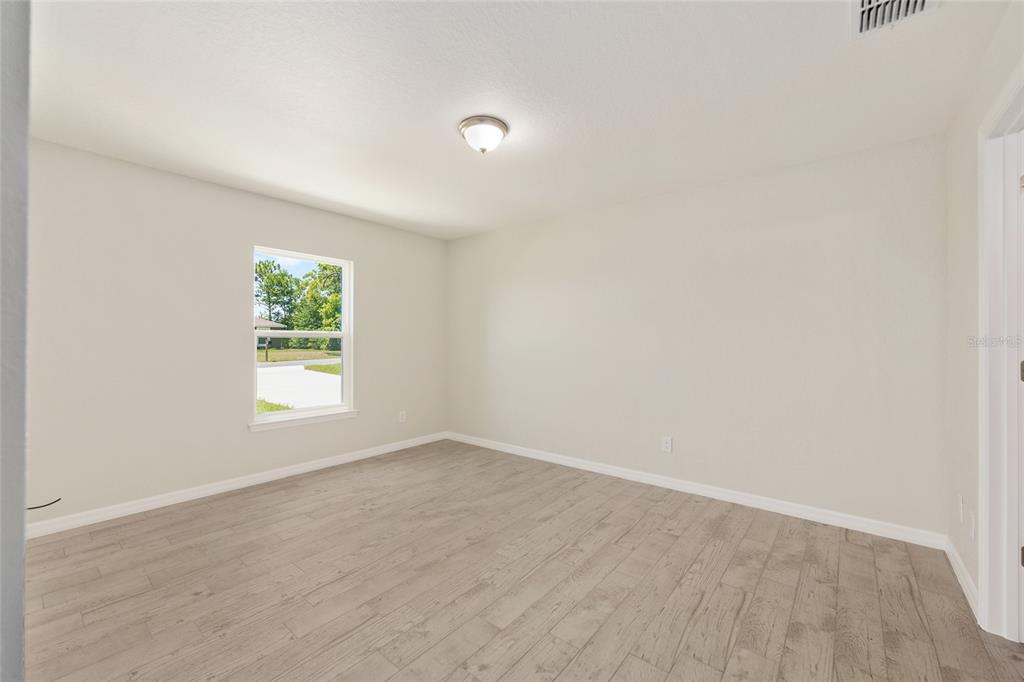 29 Olive Cir Loop Ocala, FL 34472 - Photo 23 of 49 an empty room with a window