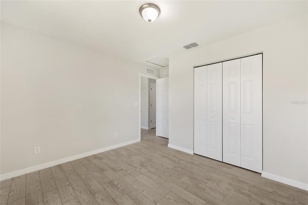 29 Olive Cir Loop Ocala, FL 34472 - Photo 27 of 49 a view of a room with wooden floor