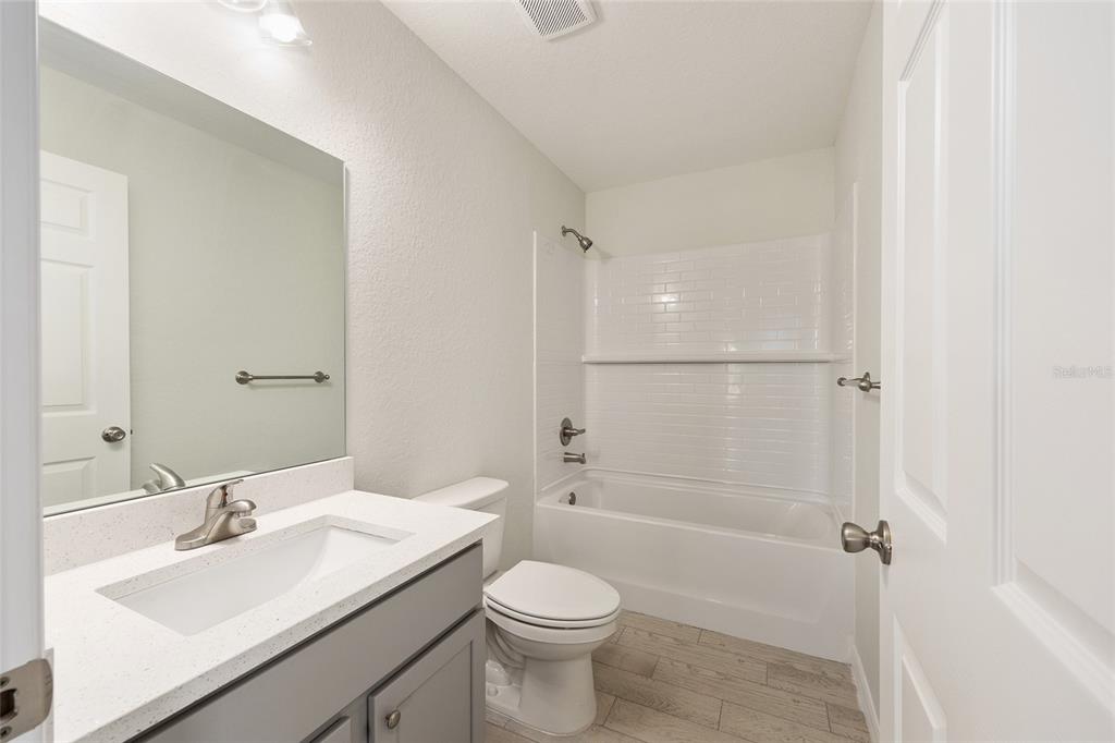29 Olive Cir Loop Ocala, FL 34472 - Photo 28 of 49 a bathroom with a sink toilet and shower