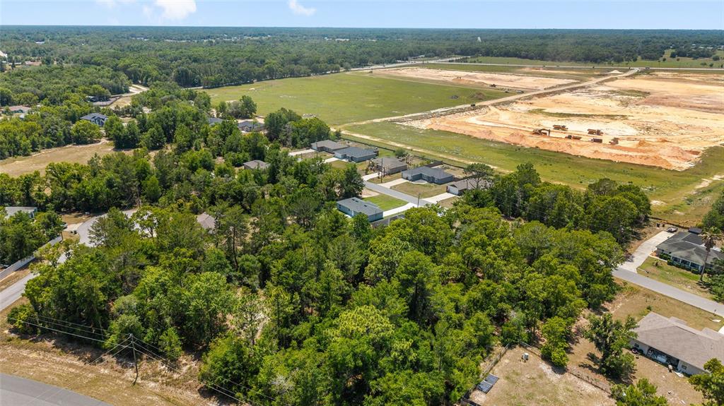 29 Olive Cir Loop Ocala, FL 34472 - Photo 47 of 49 a view of a lake from a yard