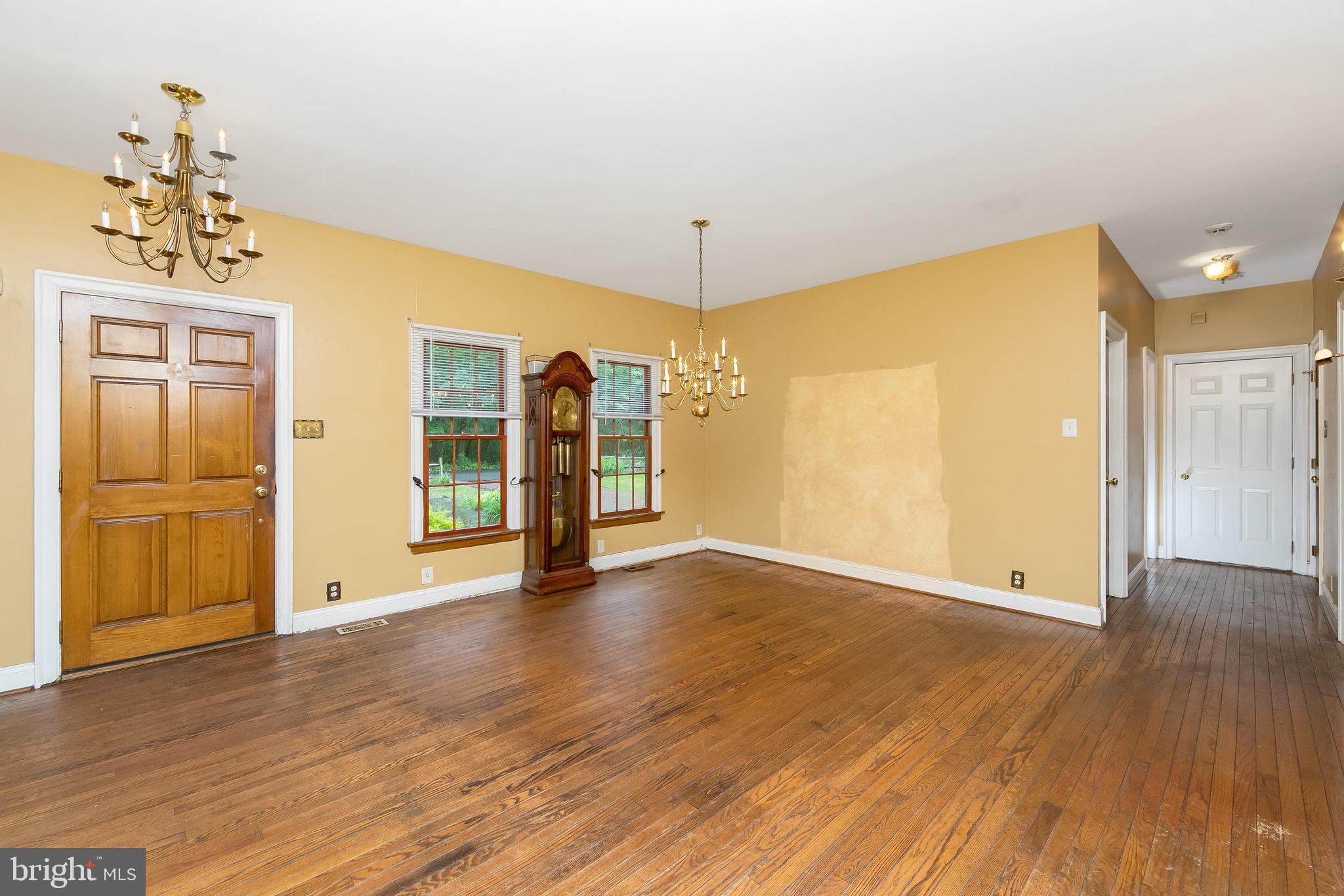 51 E Road Gibbsboro, NJ 08026 - Photo 12 of 42 a view of an empty room with window and wooden floor