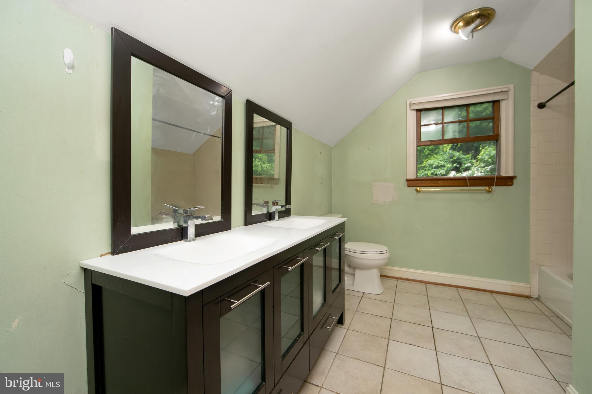 51 E Road Gibbsboro, NJ 08026 - Photo 34 of 42 a bathroom with a sink a toilet and mirror