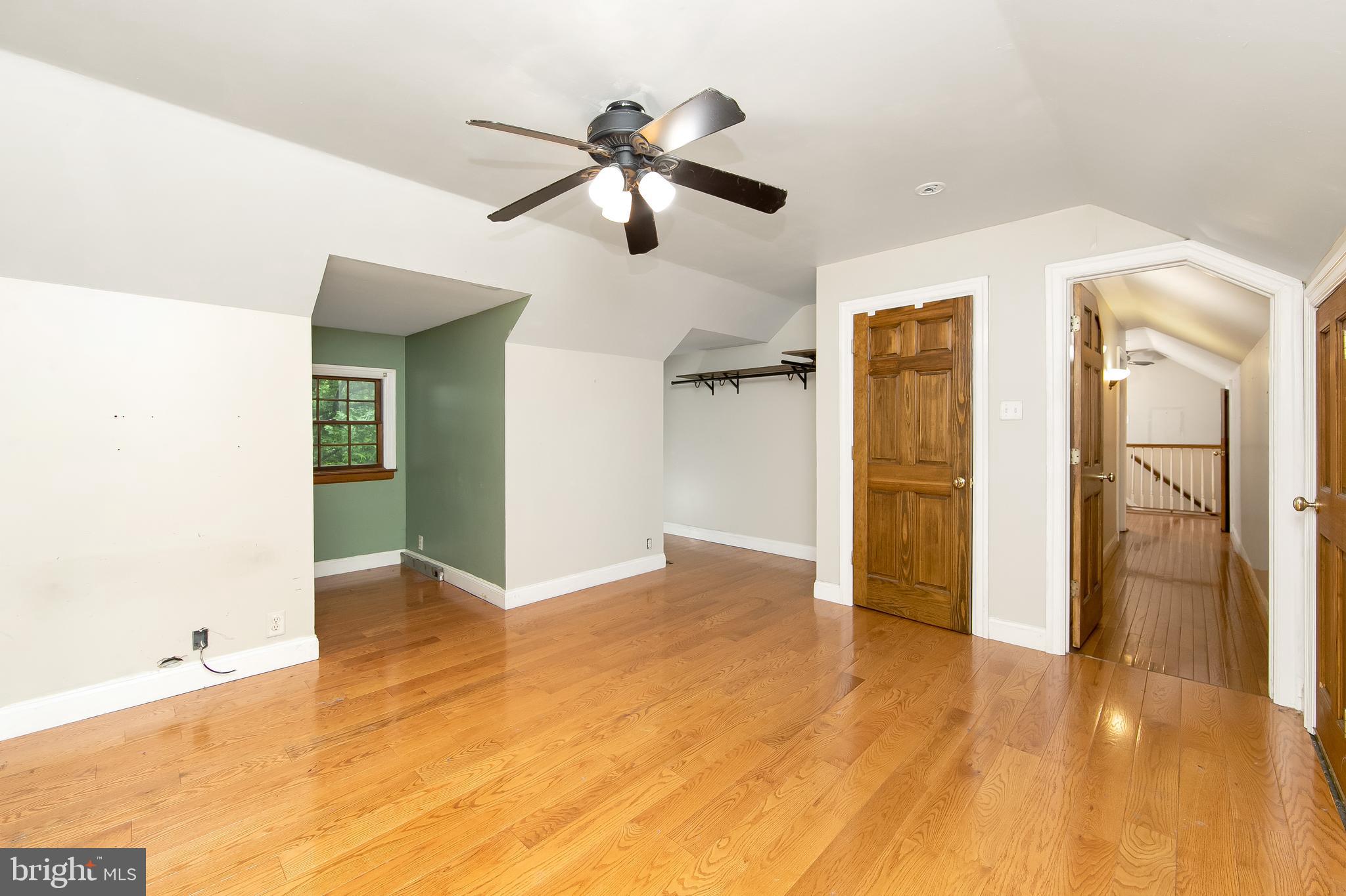 51 E Road Gibbsboro, NJ 08026 - Photo 36 of 42 a view of empty room with wooden floor and ceiling fan
