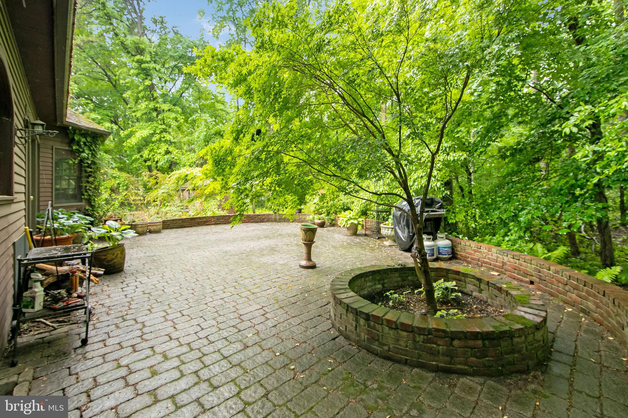 51 E Road Gibbsboro, NJ 08026 - Photo 5 of 42 a backyard of a house with table and chairs