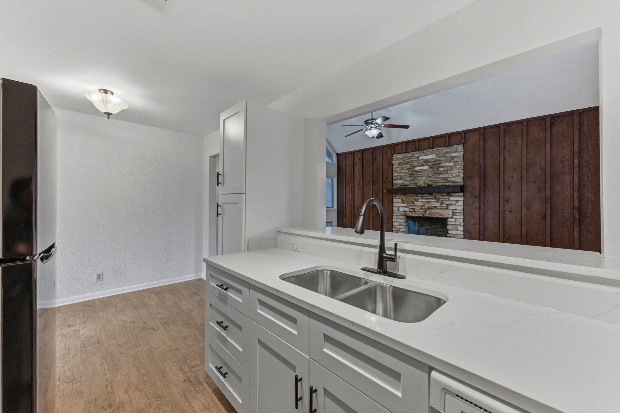 2711 St Edwards Circle Austin, TX 78704 - Photo 23 of 40 Unit 2 also has a remodeled kitchen with quartz countertops and modern appliances, designed for daily use and easy upkeep.