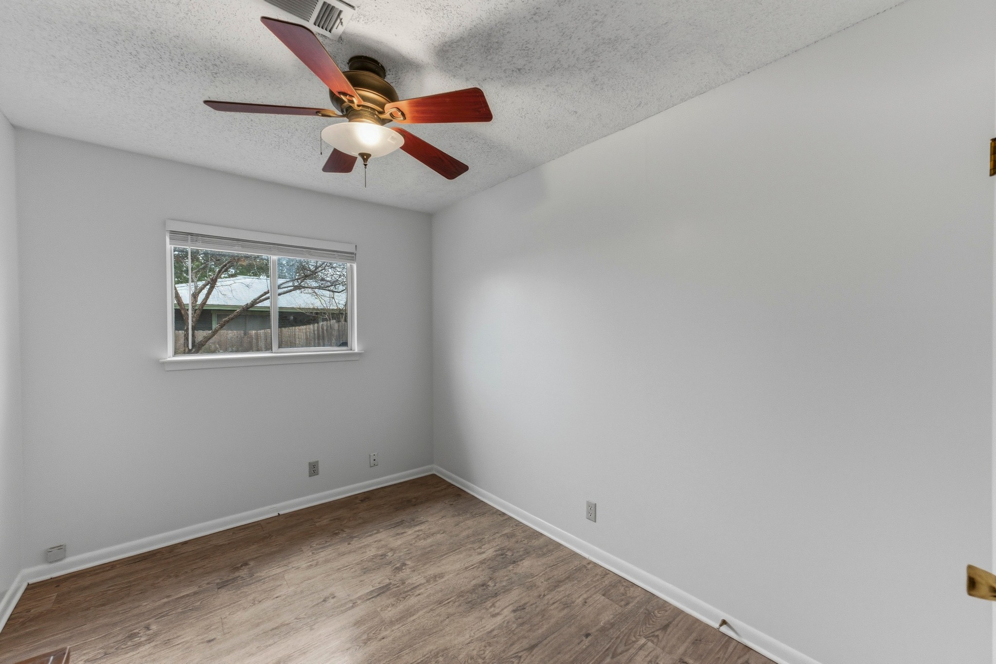 2711 St Edwards Circle Austin, TX 78704 - Photo 33 of 40 The layouts for the downstairs bedrooms support a variety of furniture arrangements.