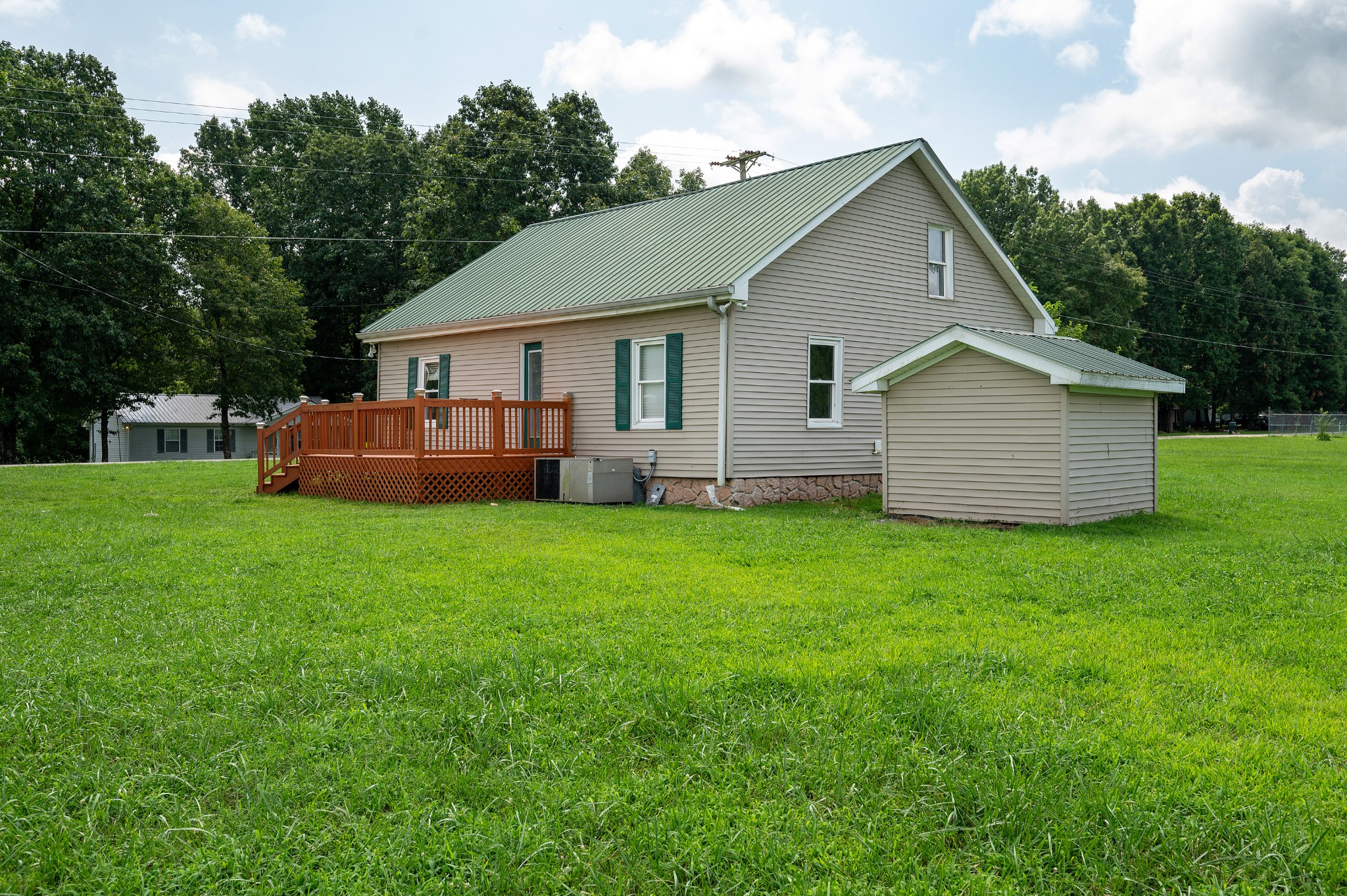 847 Chaffin Road Lafayette, TN 37083 - Photo 28 of 42 a front view of house with yard and green space