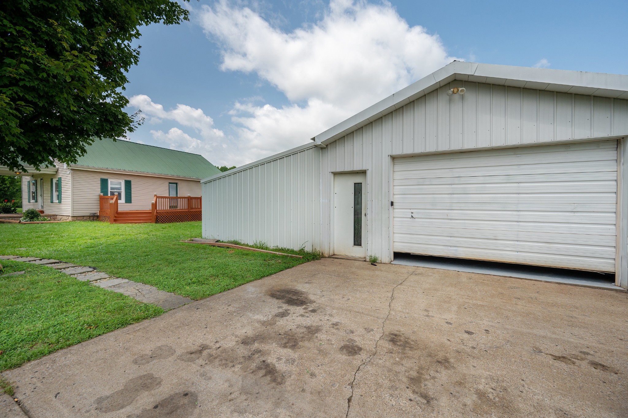 847 Chaffin Road Lafayette, TN 37083 - Photo 30 of 42 a view of a house with a yard