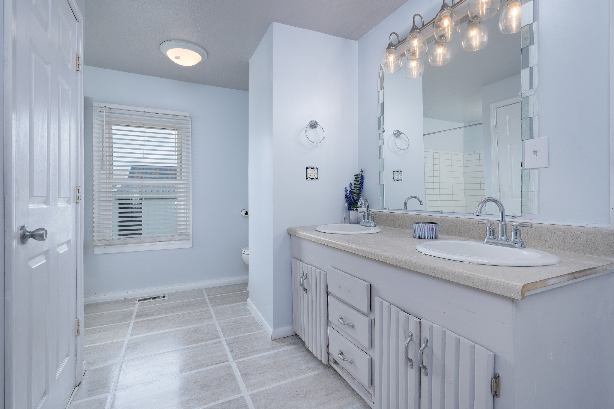 847 Chaffin Road Lafayette, TN 37083 - Photo 10 of 42 a bathroom with a double vanity sink mirror and