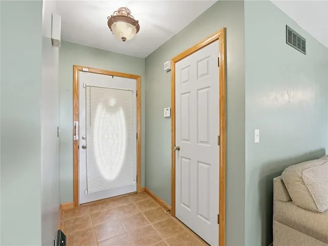 a view of a hallway with closet area