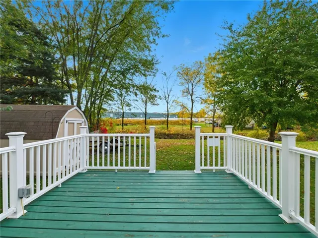 a view of a park with large trees