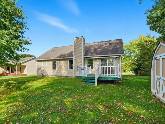 a view of backyard with green space