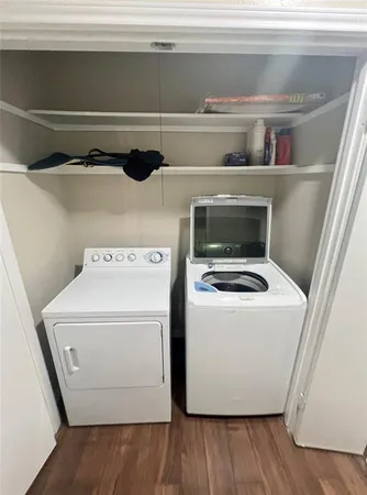 a utility room with washer and dryer