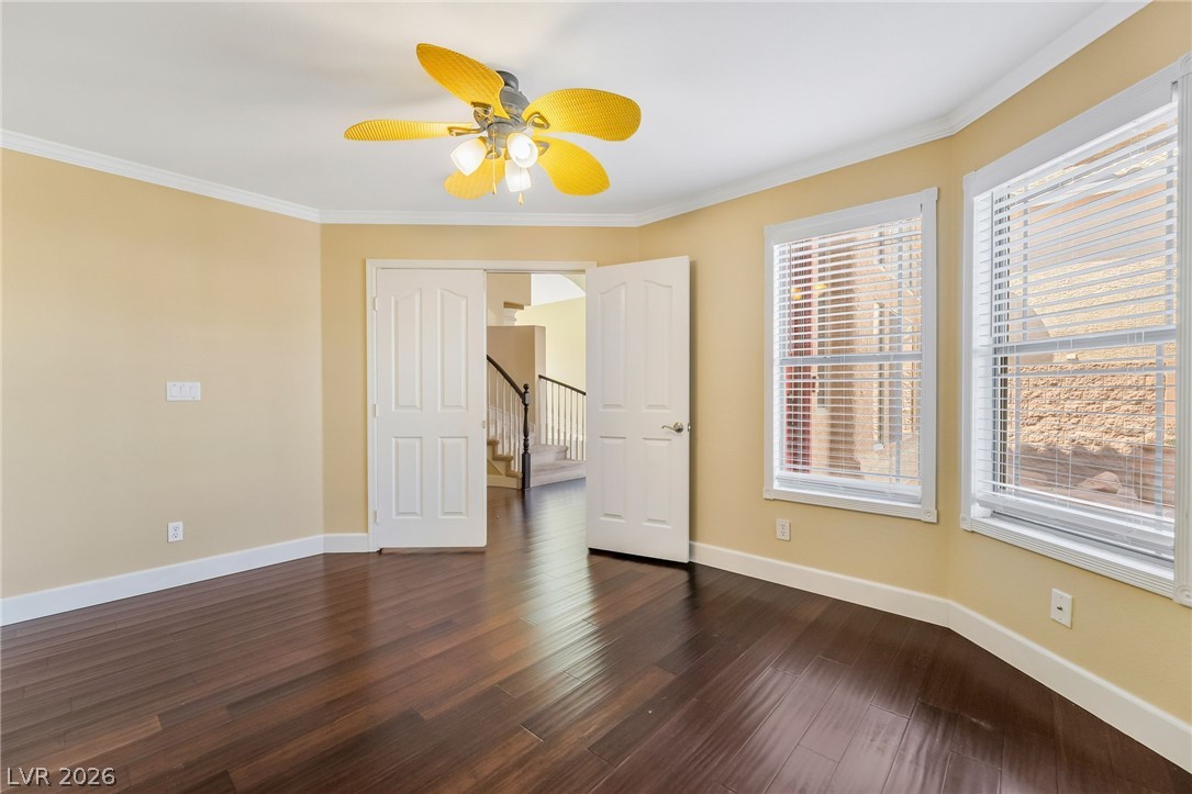 271 Pointe Ranier Avenue Henderson, NV 89012 - Photo 9 of 26 This versatile room features warm flooring, bright windows, and convenient access to the rest of the home.