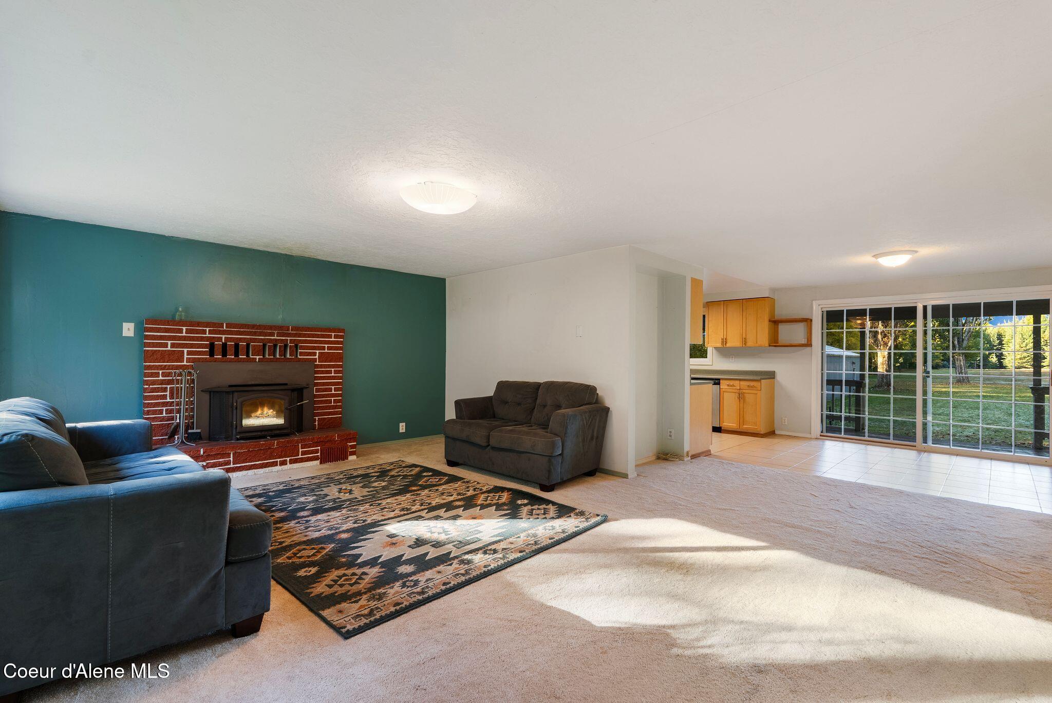 55 Trotter Lane Sandpoint, ID 83864 - Photo 18 of 80 Cozy wood burning fireplace