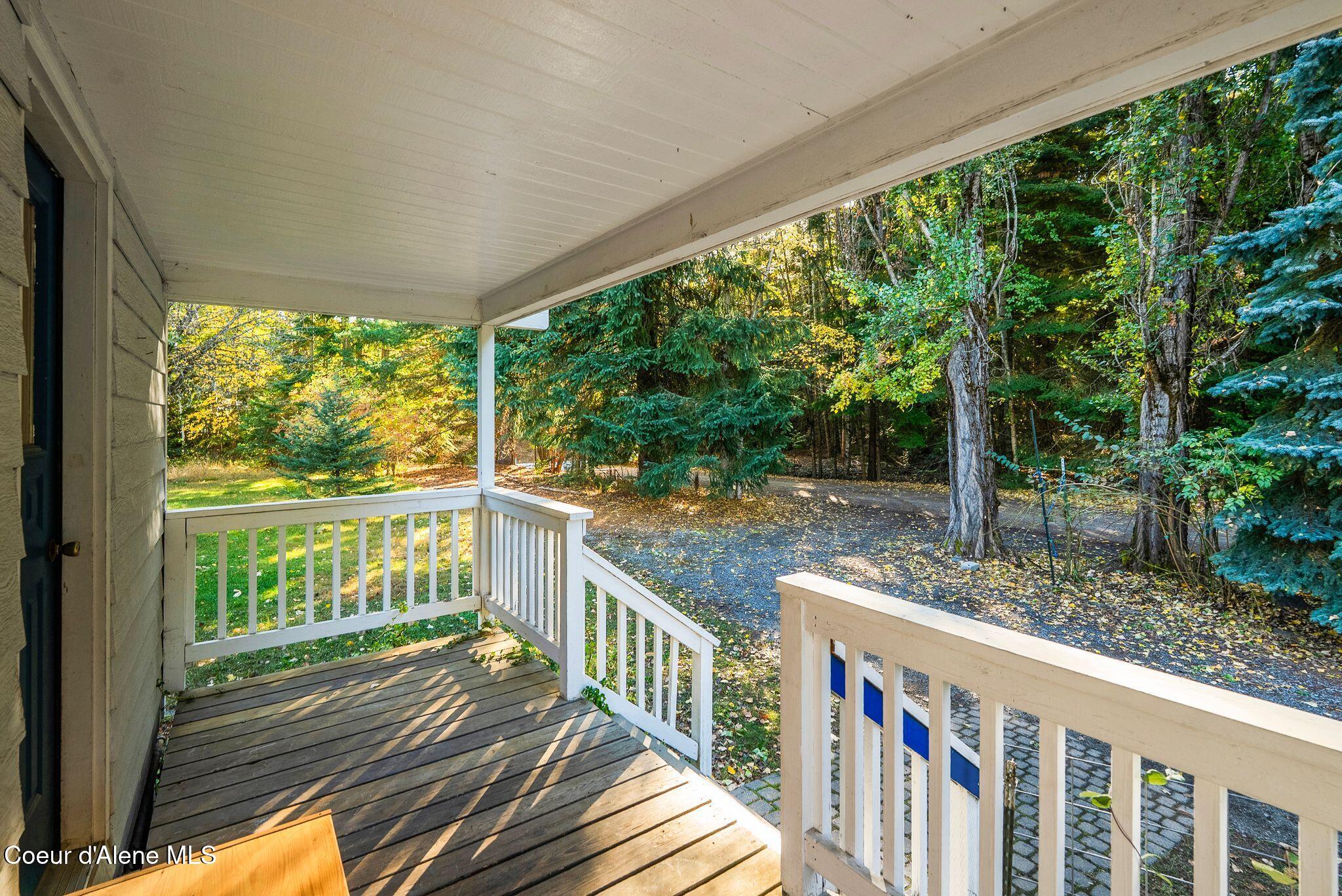 55 Trotter Lane Sandpoint, ID 83864 - Photo 19 of 80 Covered deck off living room