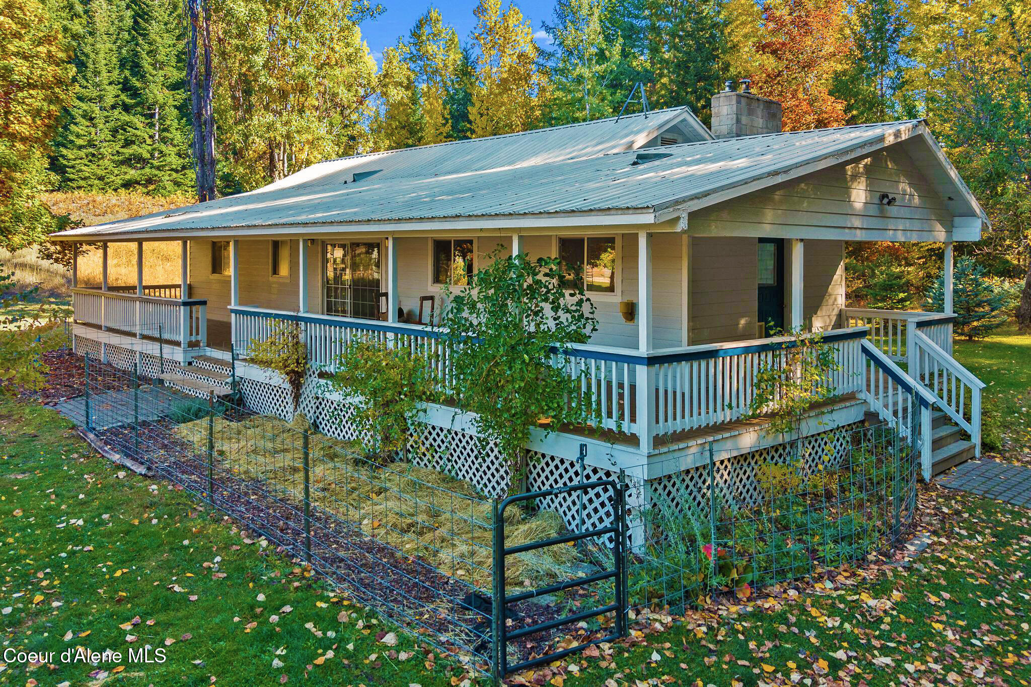 55 Trotter Lane Sandpoint, ID 83864 - Photo 6 of 80 Covered wrap-around deck